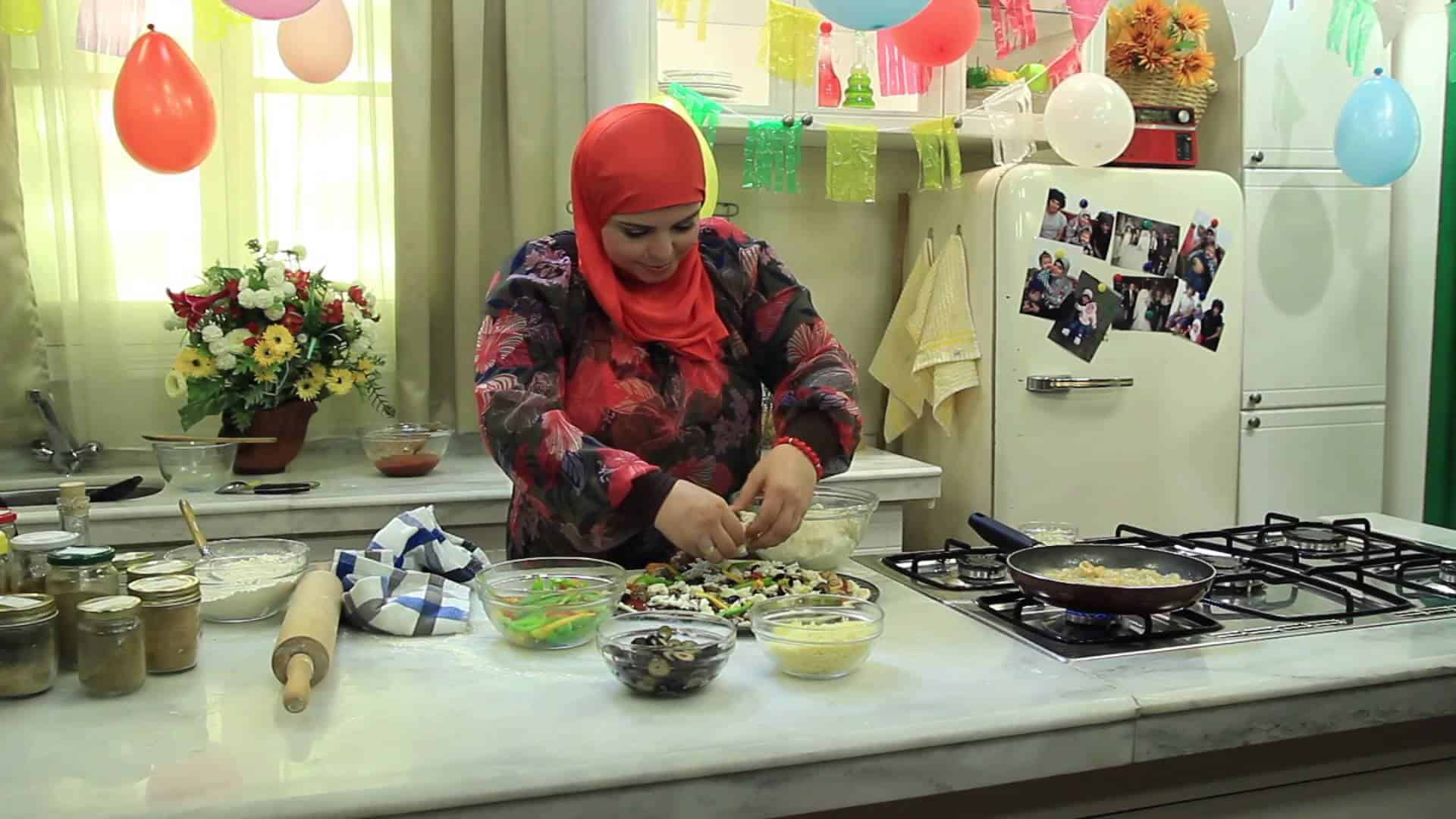 طريقة عمل عجينة البيتزا نجلاء الشرشابي