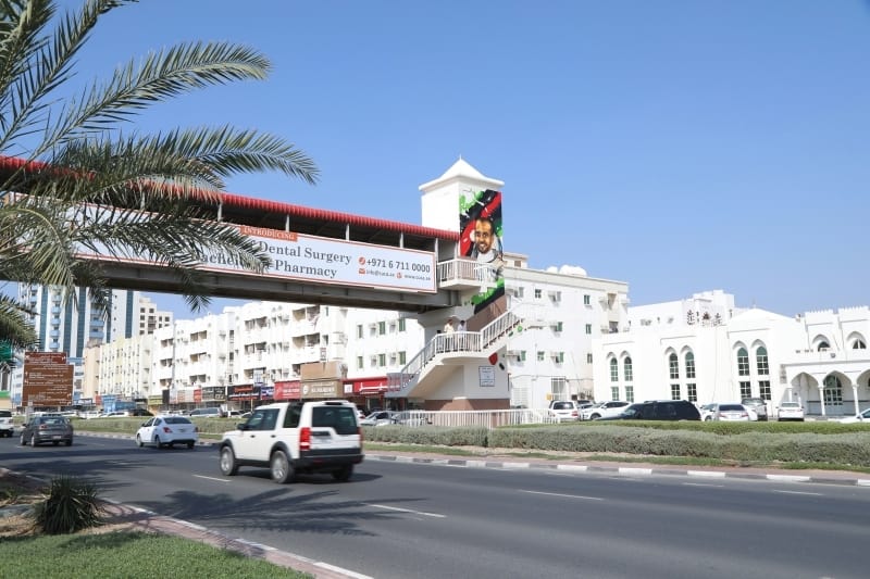 التخطيط والبلدية بعجمان تطلق اسم هزاع المنصوري على جسر مشاة